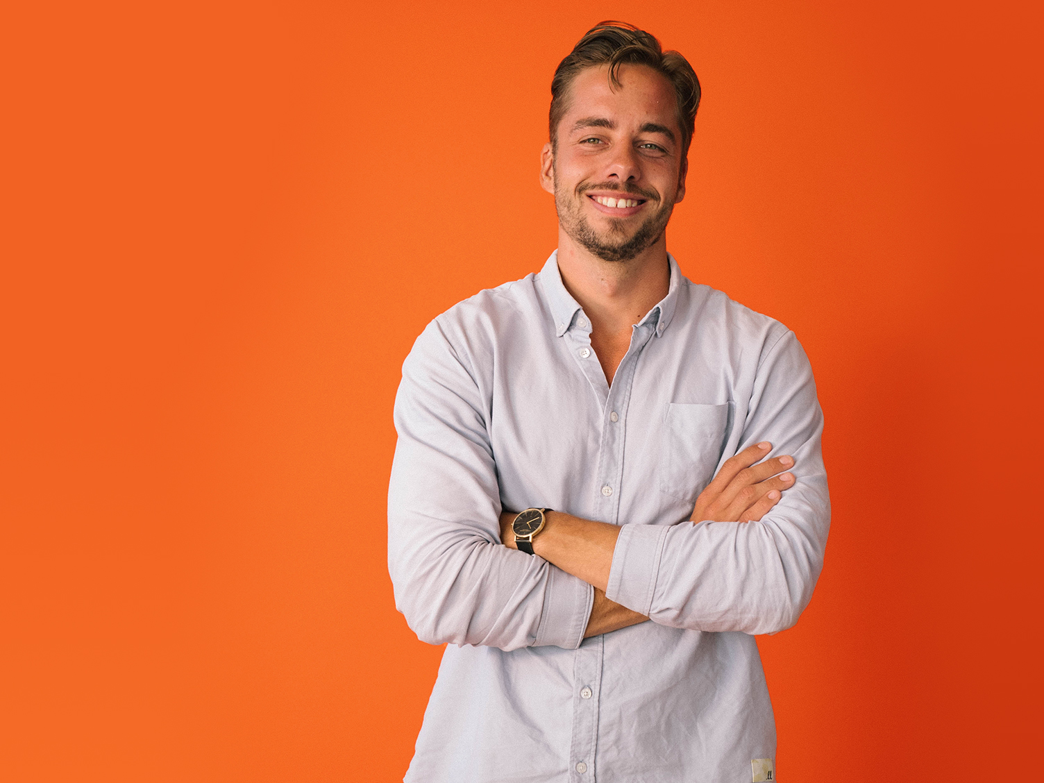 Jesper, SOUNDBOKS CEO in front of an orange background