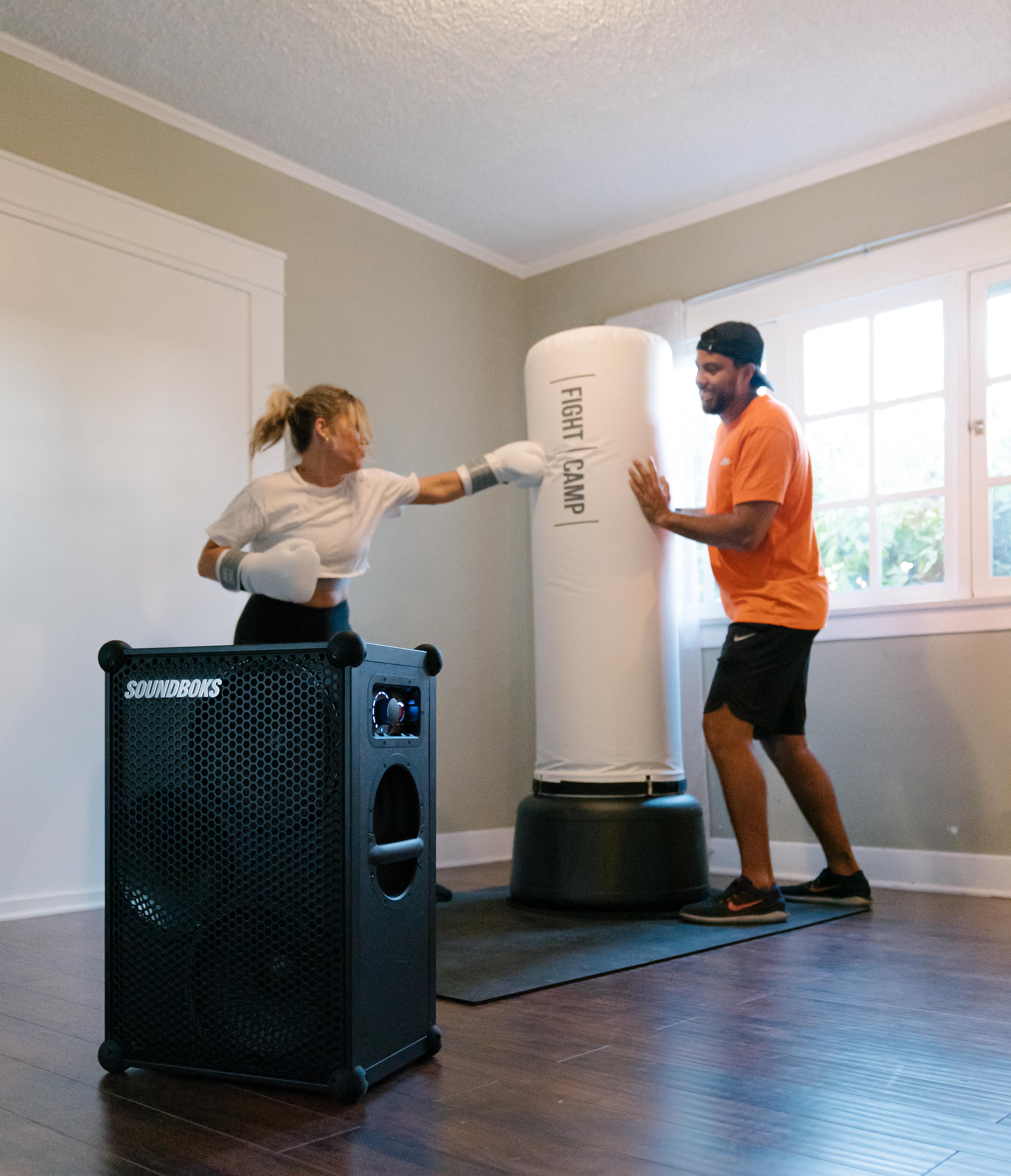 SOUNDBOKS portable bluetooth speaker in a home gym setup