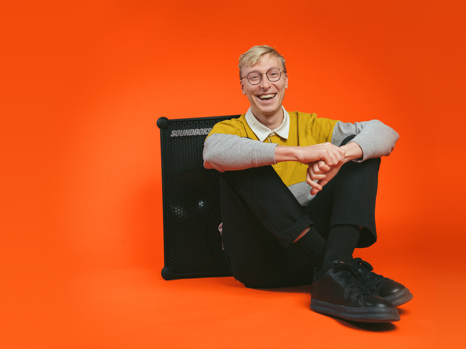 Jesper, SOUNDBOKS CEO in front of an orange background