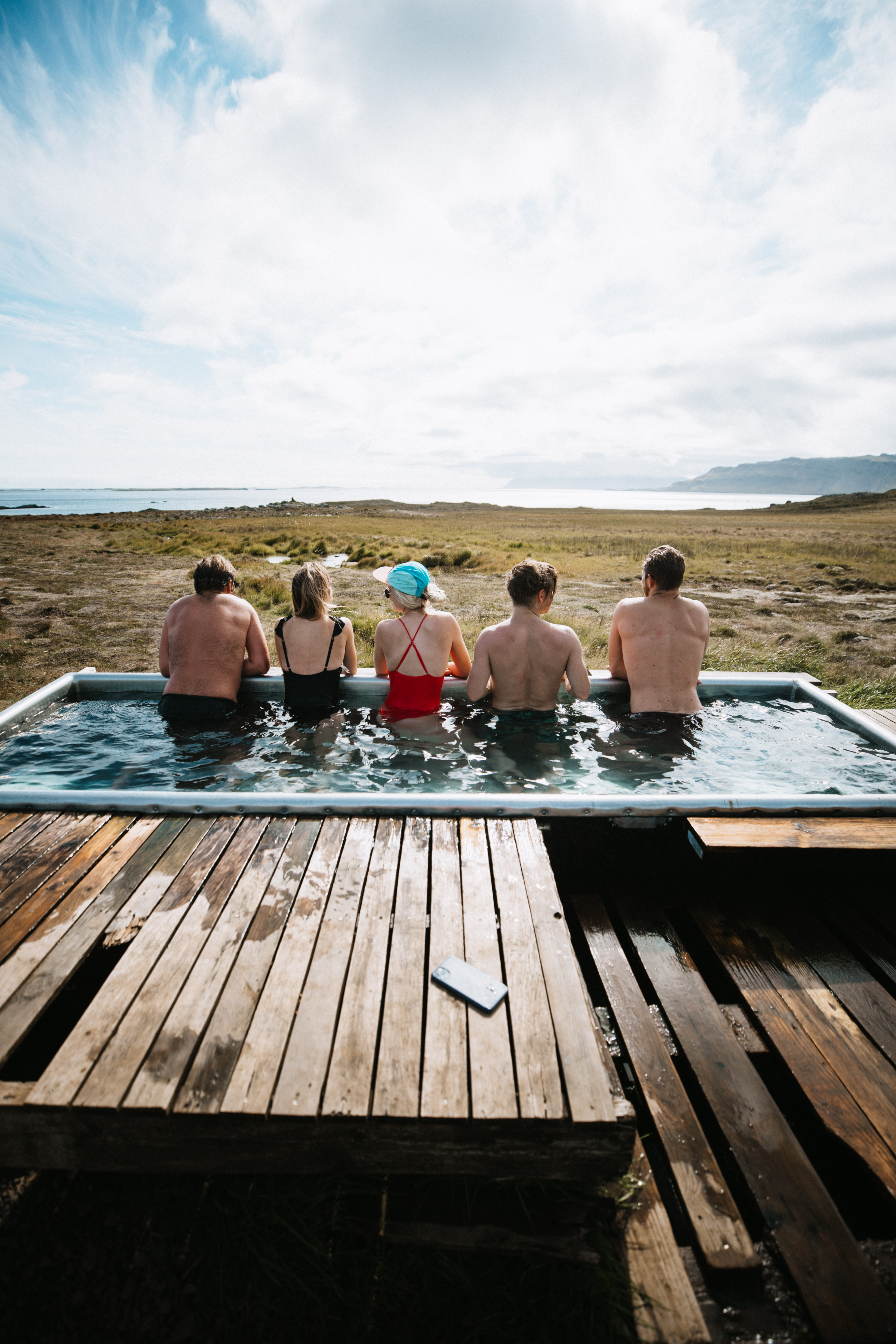 campers in a hot tub in iceland