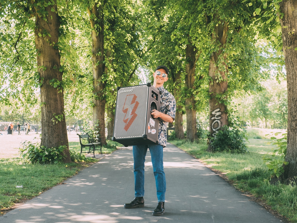 Johan Buchler with limited edition artist grill in white with red lightning bolt