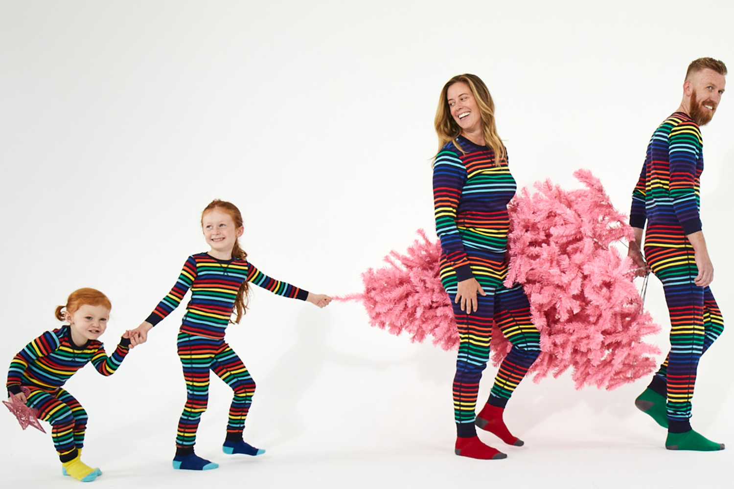 Primary navy rainbow matching family PJs