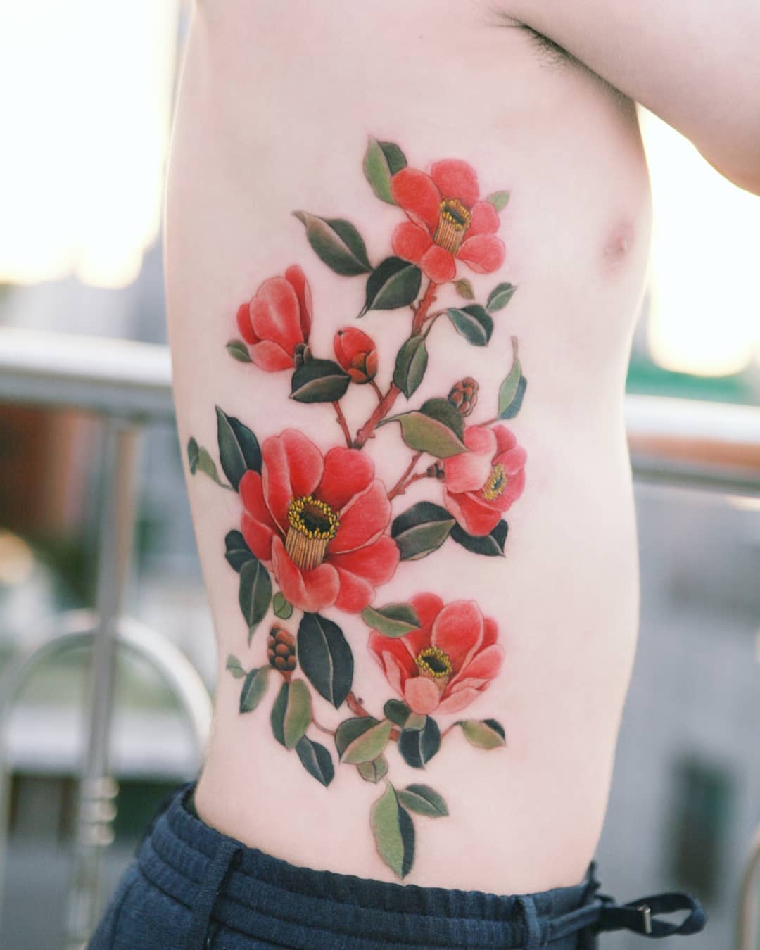 camellia red blooming flower tattoo