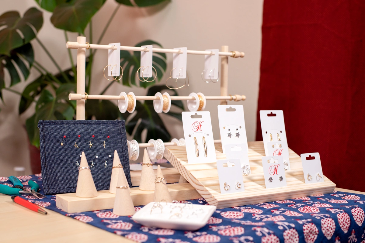 Carded jewelry display with earrings, necklaces, and rings