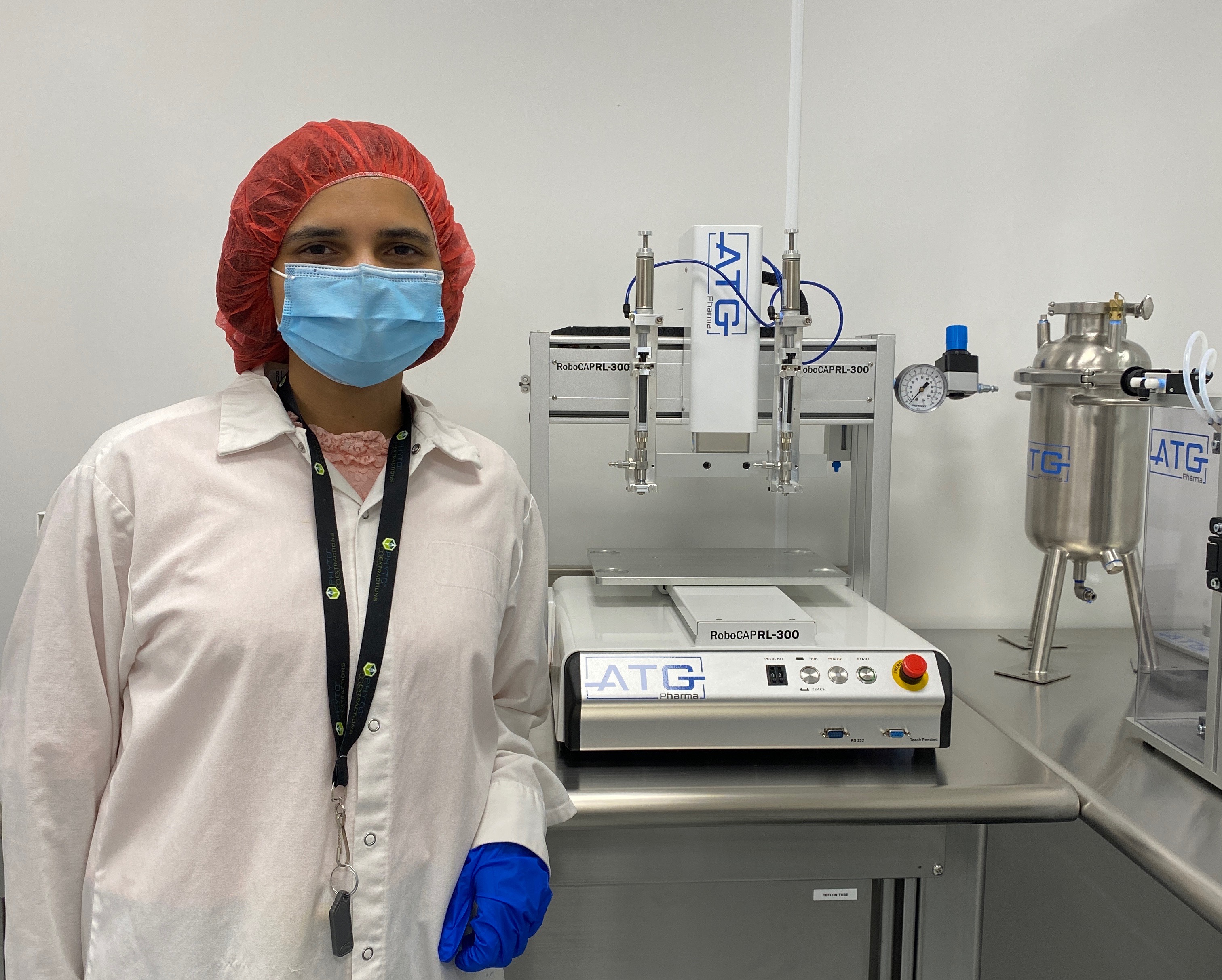 Head of Labs standing infront of ATG RoboCAP RL-302 VF