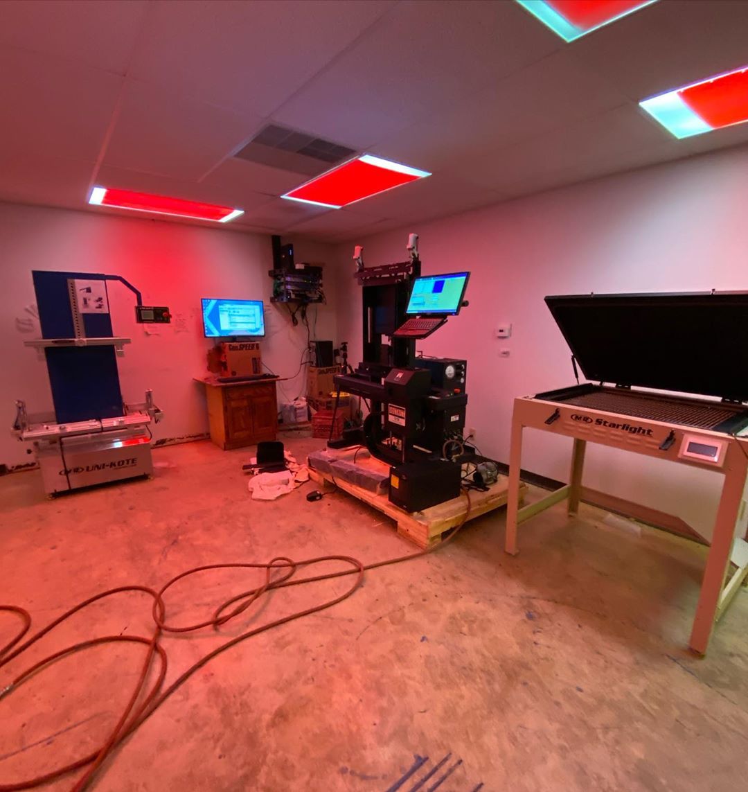 An advanced screen printing screen room with a M&R UniKote, M&R Starlight, and Douthitt CTS machine.