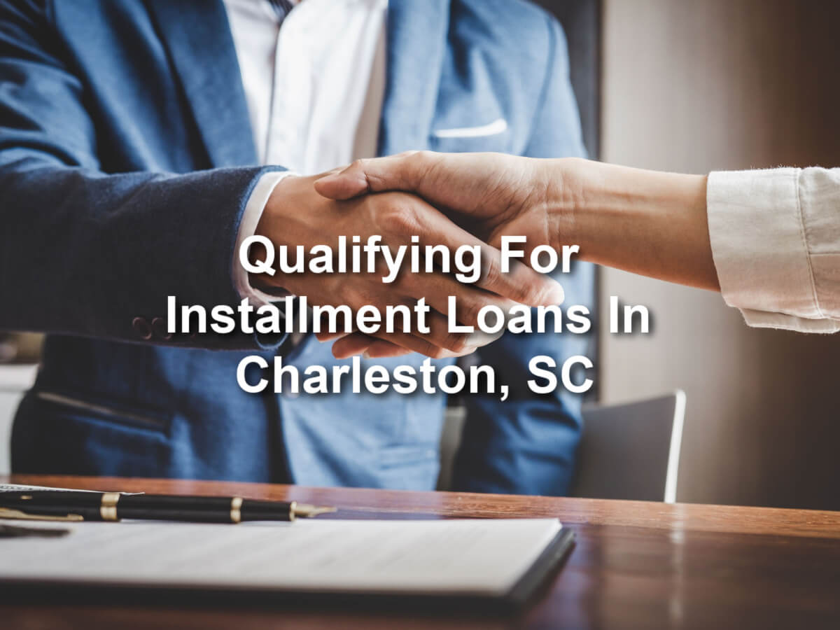 representative shaking hands with applicant with overlay text Qualifying for installment loans Charleston, SC