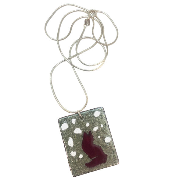 Enameled pendant with red fox and snow flurries