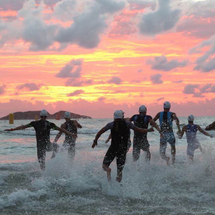 triathletes at swim start at the inaugural IRONMAN 70.3 Florianópolis