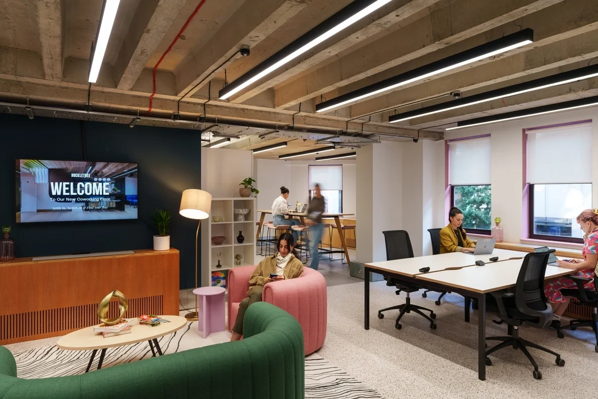 Huckletree members working together in a collaborative workspace