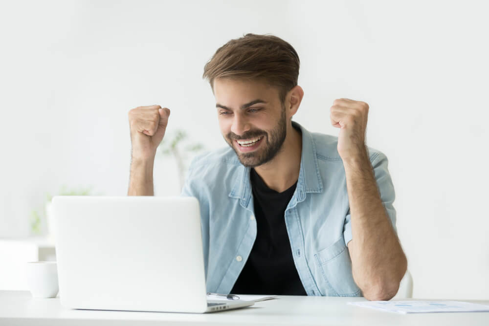 man happy from payday loan approval online