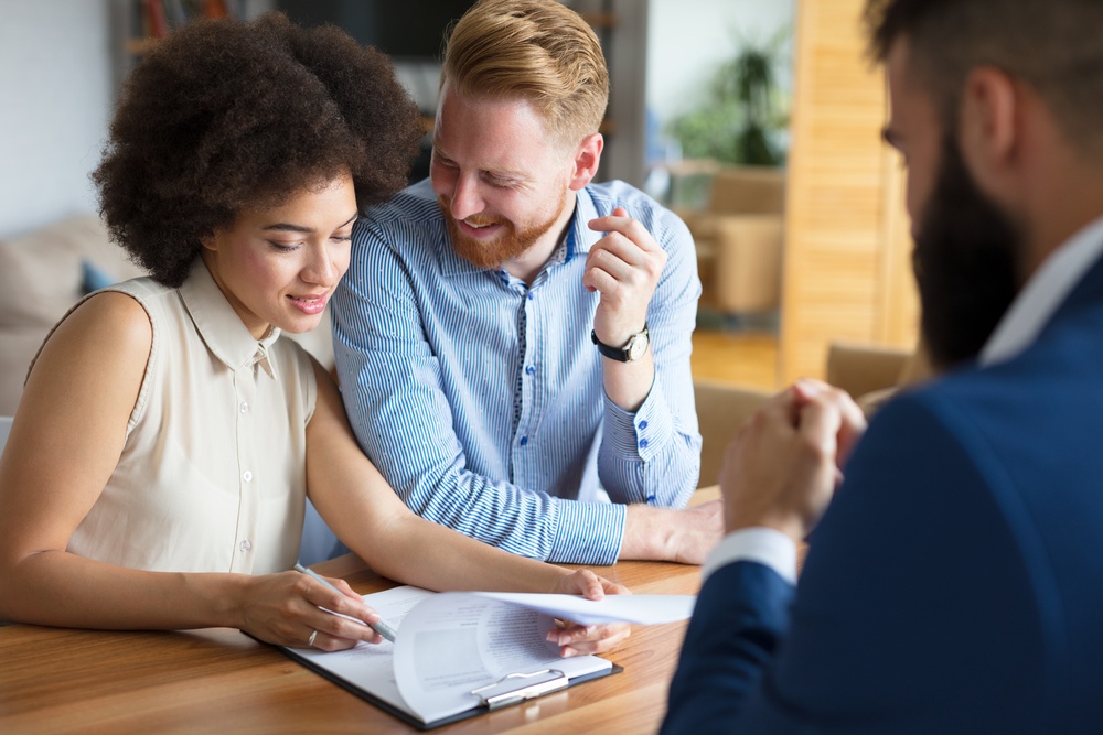 couple looking at a mortgage application
