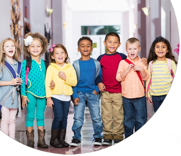 Multiracial group of children in preschool hallway