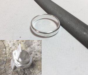 Silver ring and wire used to create the crystal drop banded ring