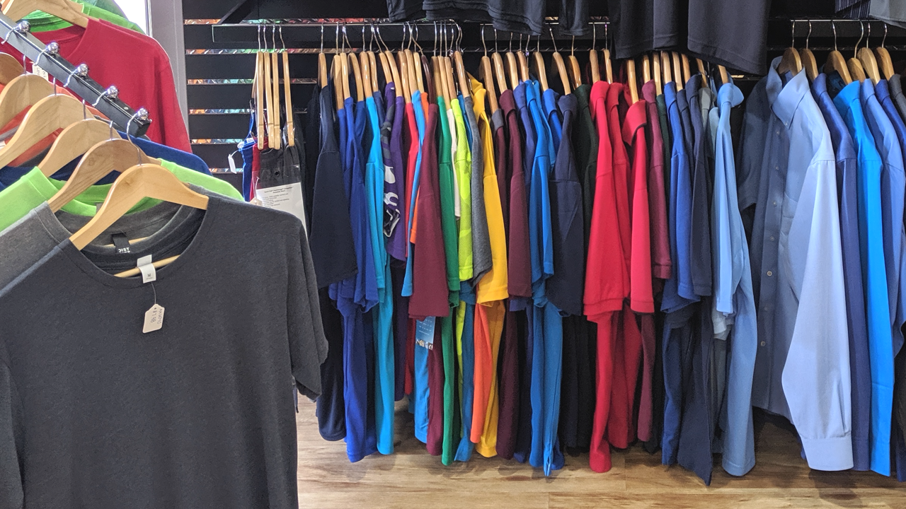 T-shirts and garments on display at a screen printing shop