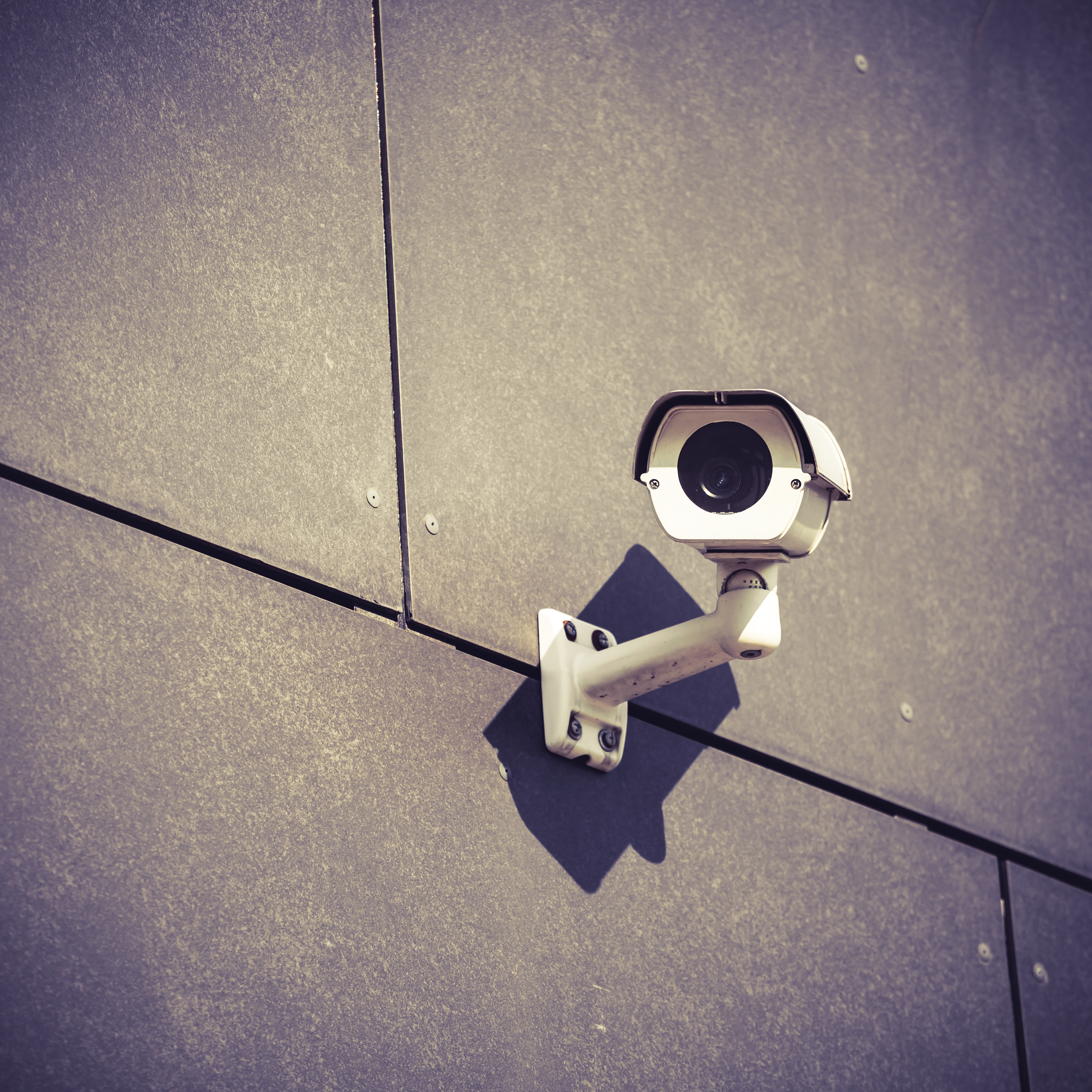 Security camera on a wall