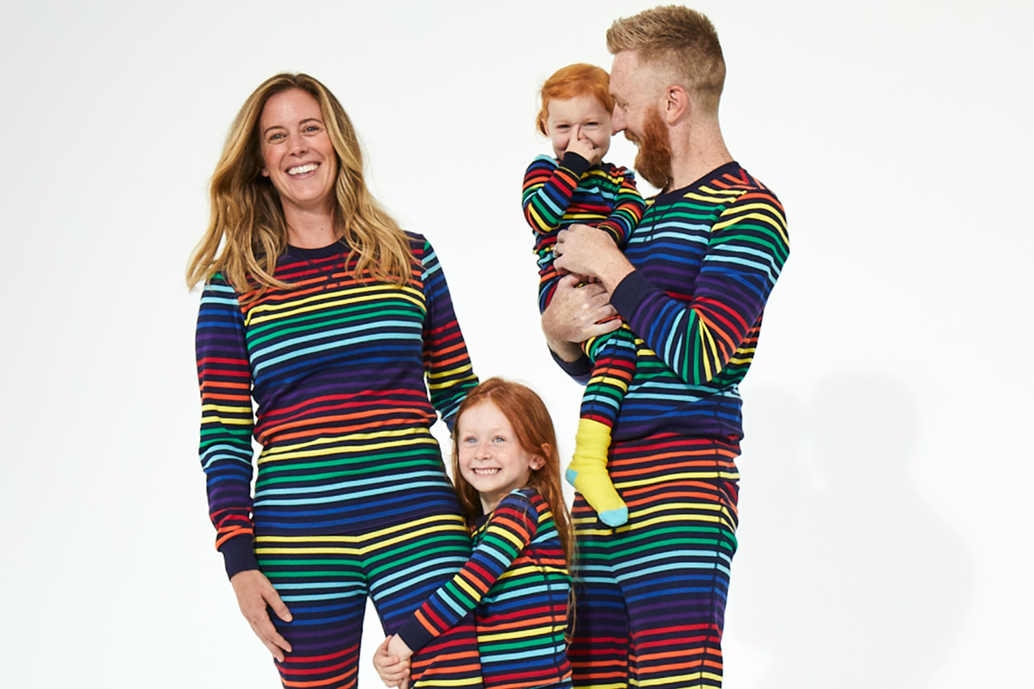 Primary navy rainbow matching family PJs