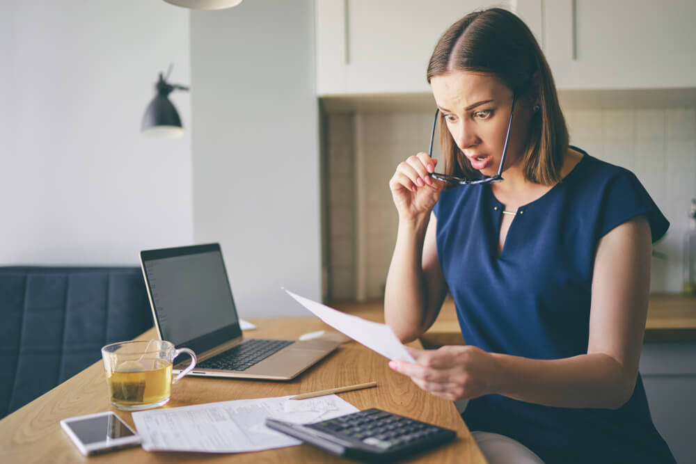 woman needs an online title loan for utility bills