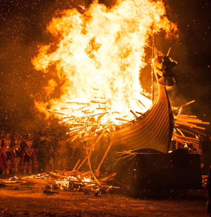 Vikings burning their ships.jpg