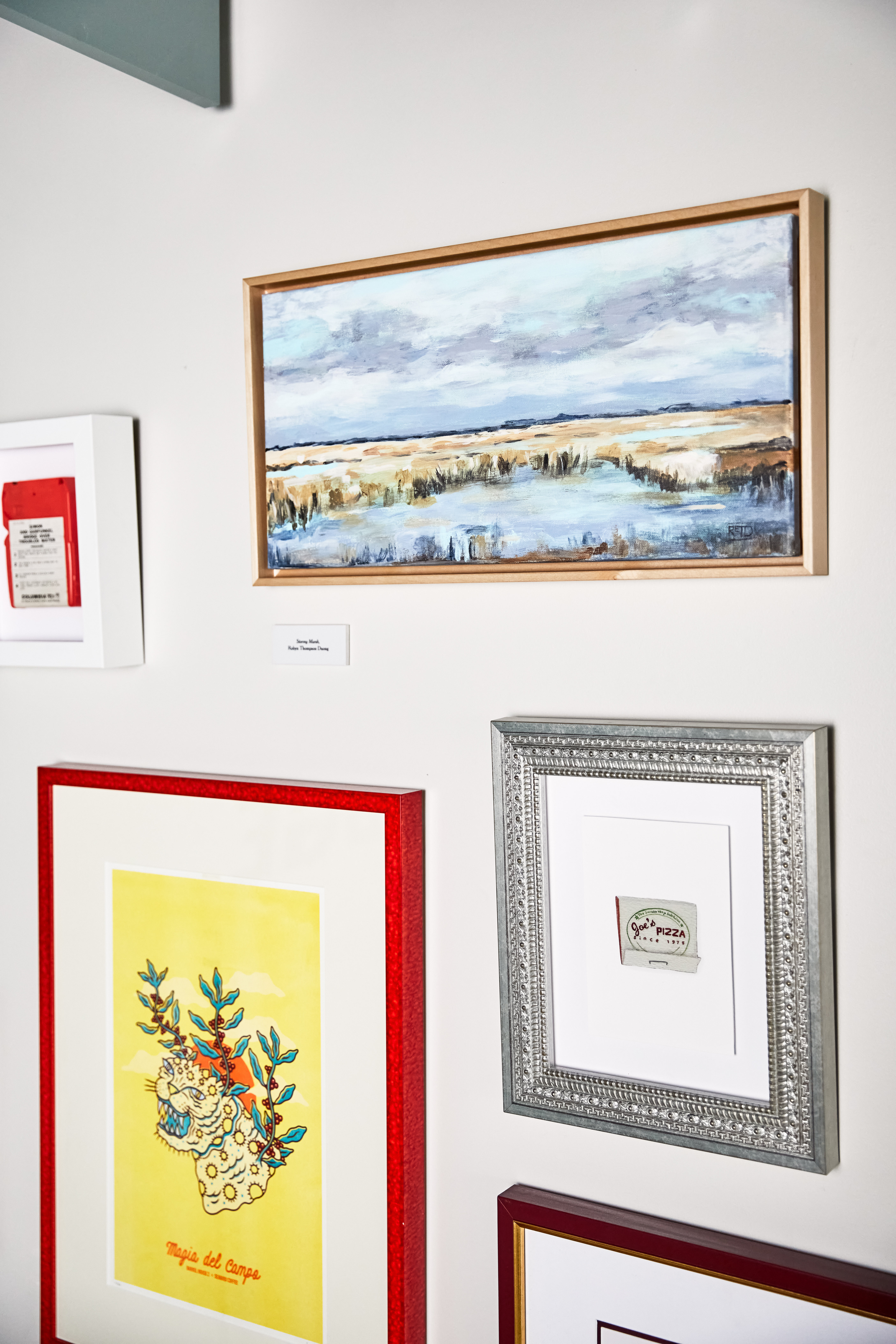 close up on frames in gallery wall