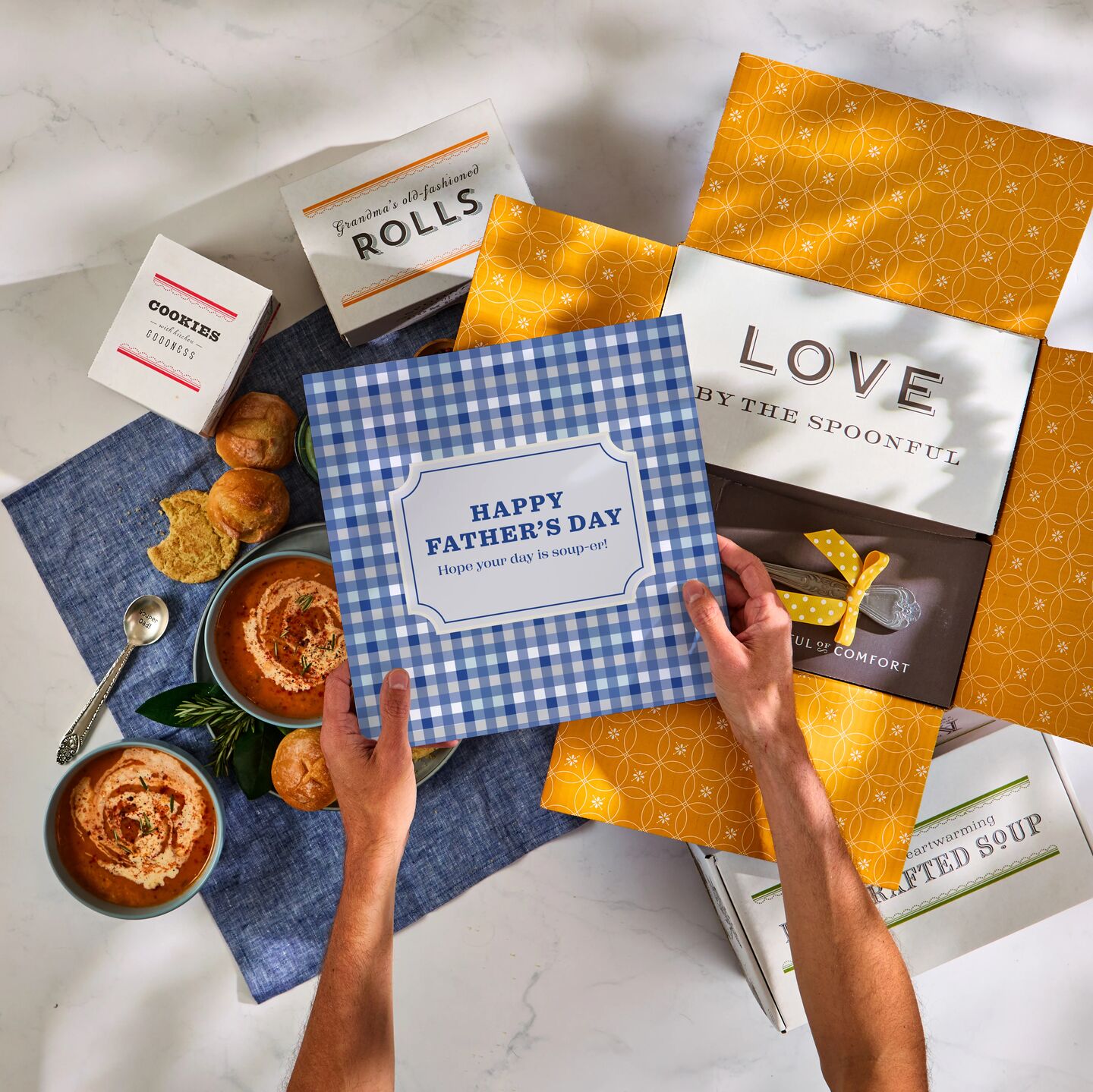 Father's Day package unboxing with soup, rolls and cookies