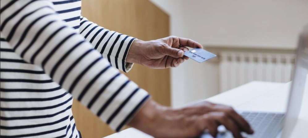 Person paying online using a credit card