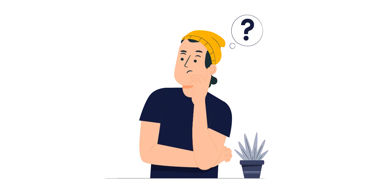 A man thinking about why he should use a headless cms next while standing next to a small plant. 
