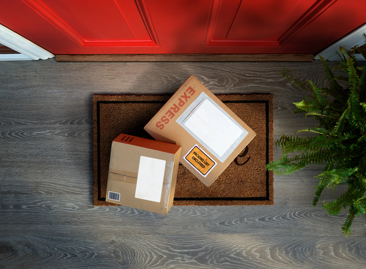 Delivery parcels left on a front doorstep at Christmas time