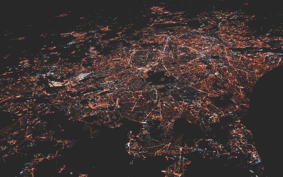 A city shown from a satellite at night