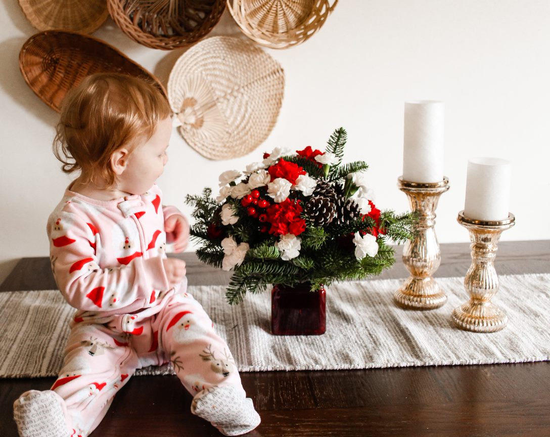 Child with Christmas bouquet