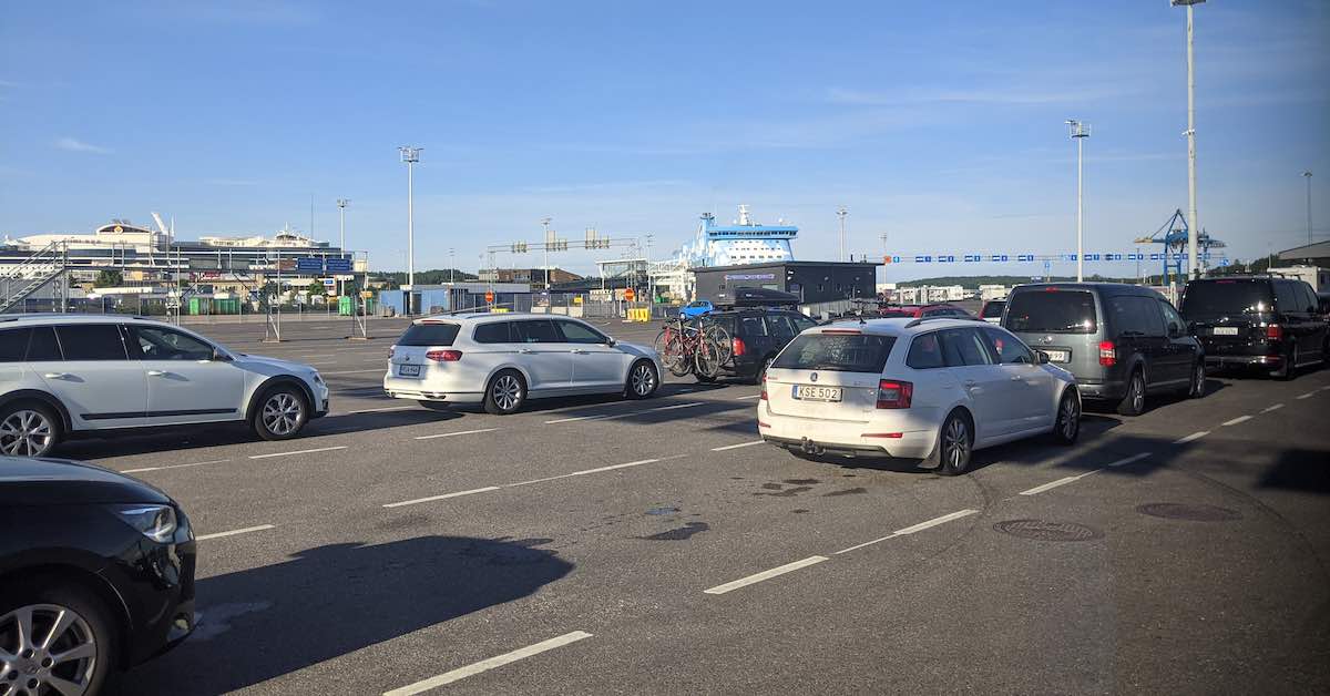 Cars lining up to get on a ferry
