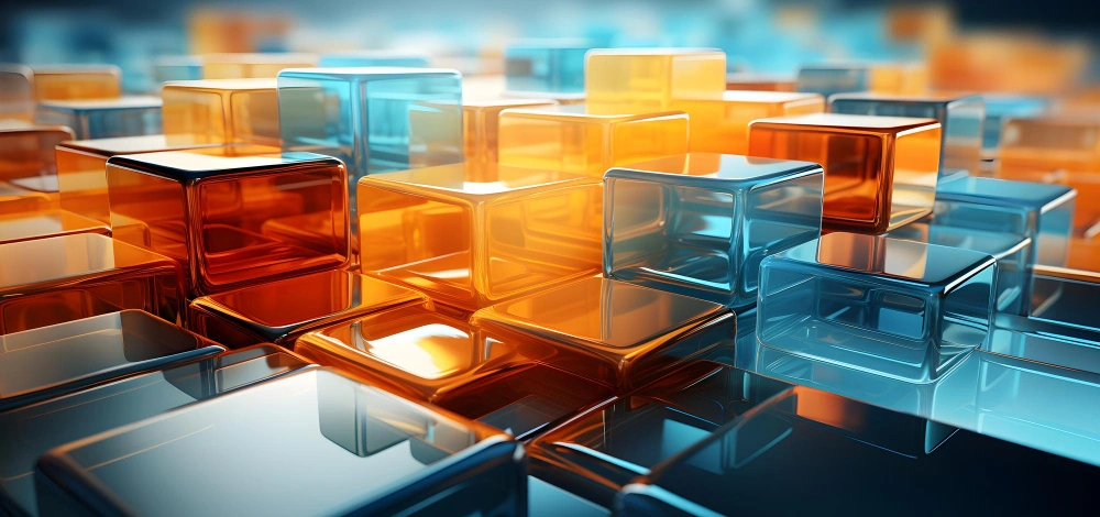 A close-up image of a 3D rendering of shiny, translucent cubes in blue and orange, possibly representing digital data or technology concepts.