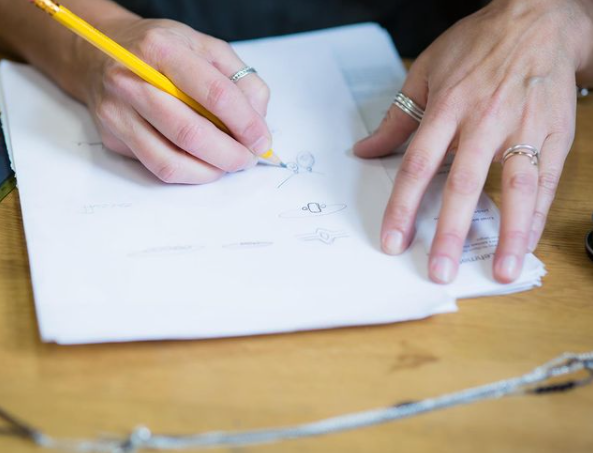 Lisa sketching a jewelry design