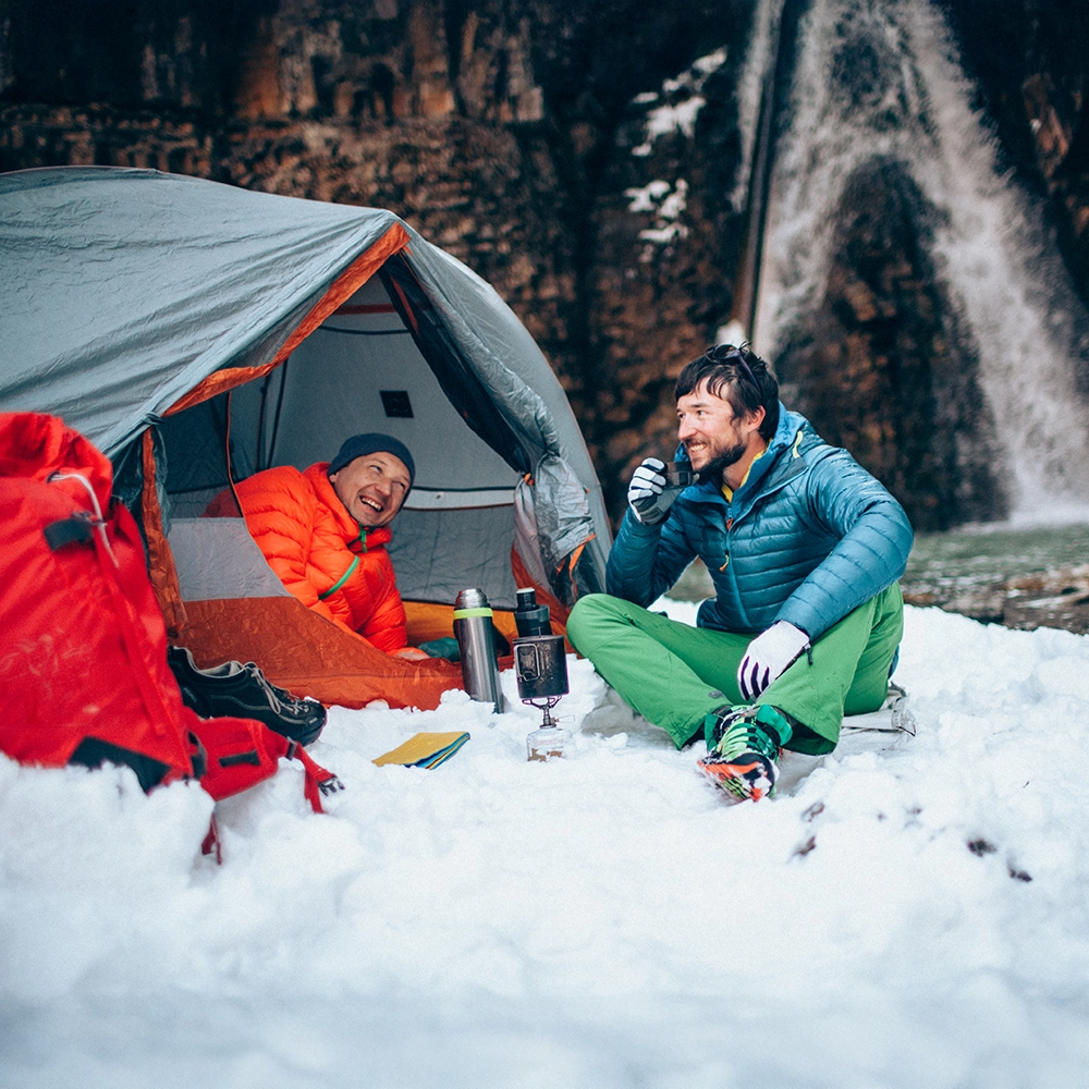 TwoGuysCampinginSnow.webp