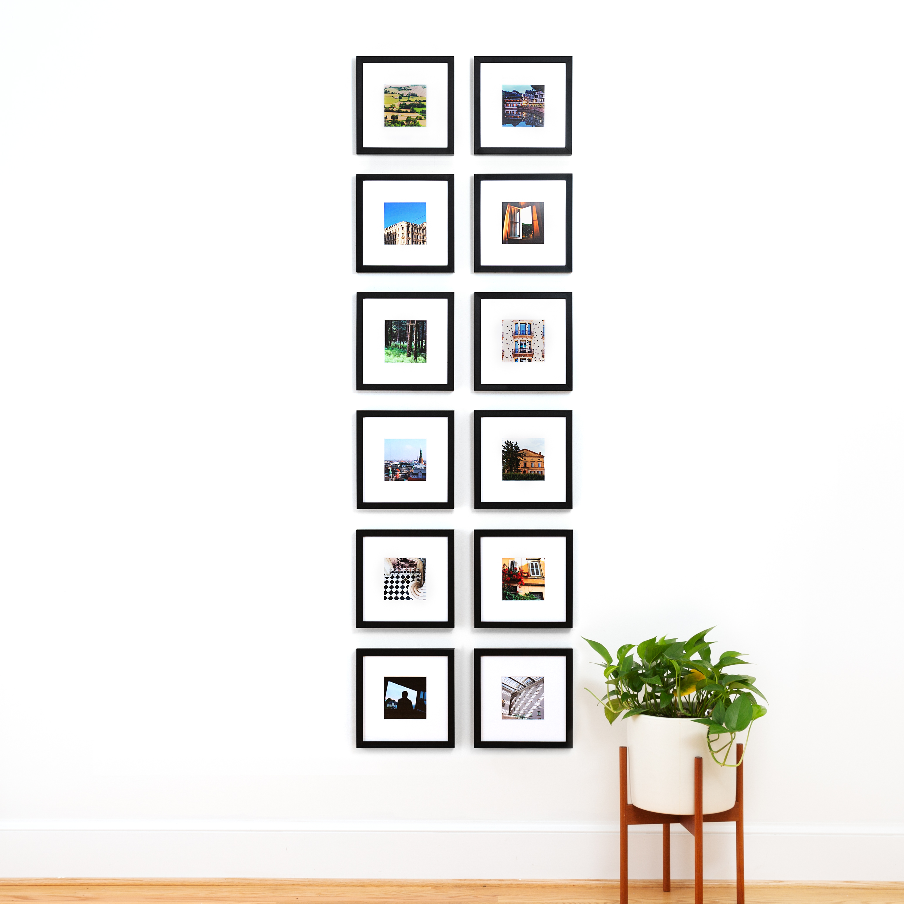 12 small frames arranged in two rows for a tall, skinny gallery wall