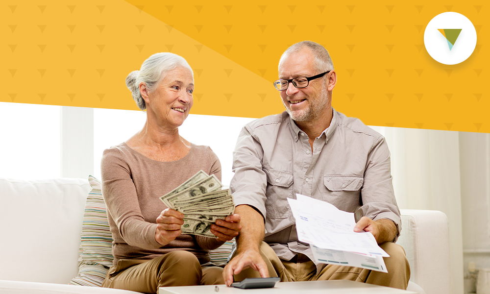 Older couple counting money.