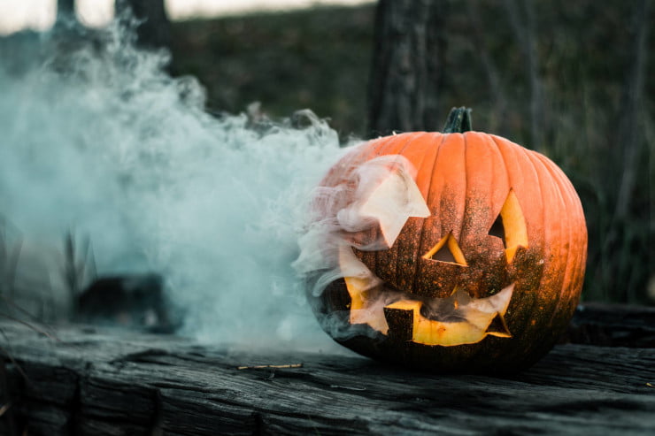 spooky smoking jack-o-lantern pumpkin - happy halloween social media post