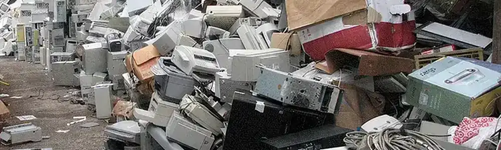 large piles of scrapped electronics