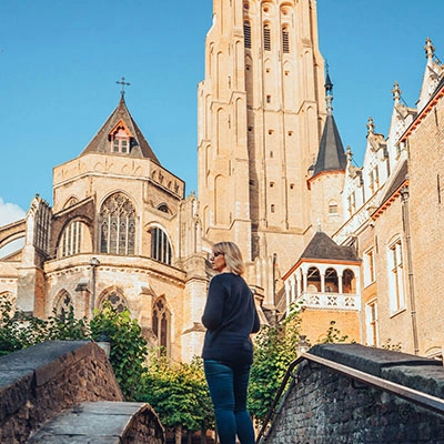 Woman standing on the Boniface Bridge.