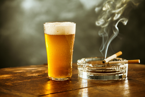 A frothy beer and cigarettes - bad for blood flow