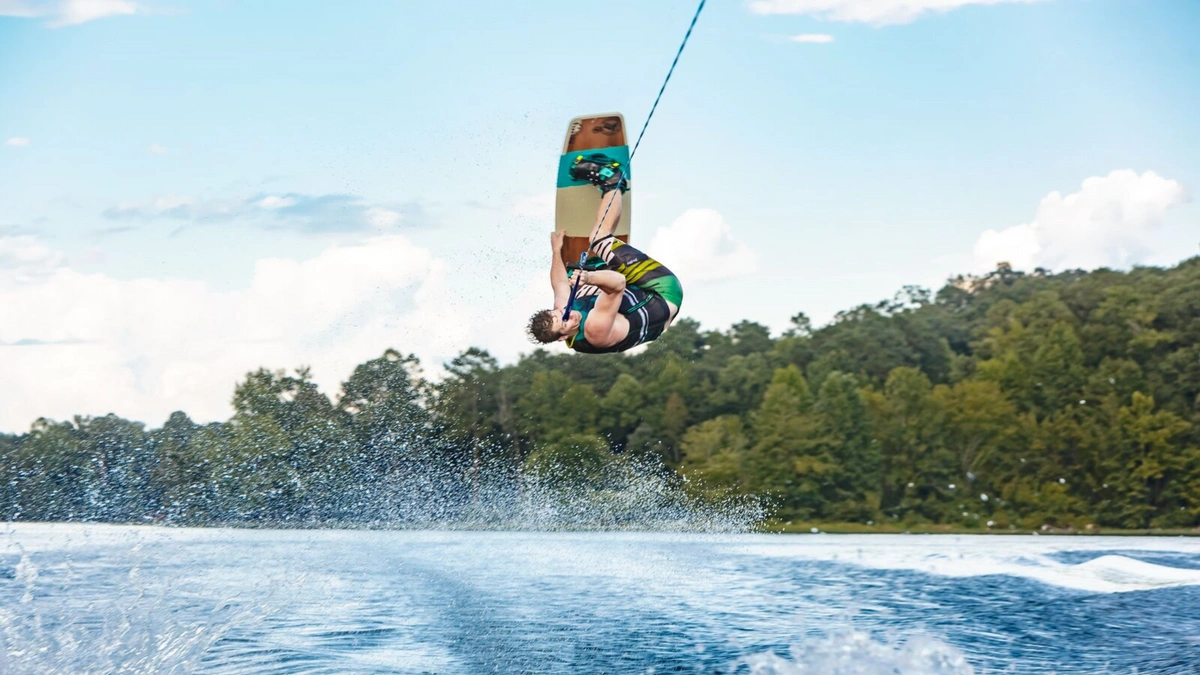 Man on a surfboard on a lake