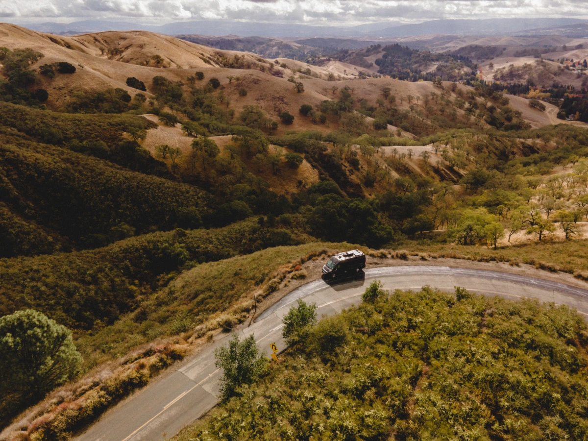 A car driving on a winding road