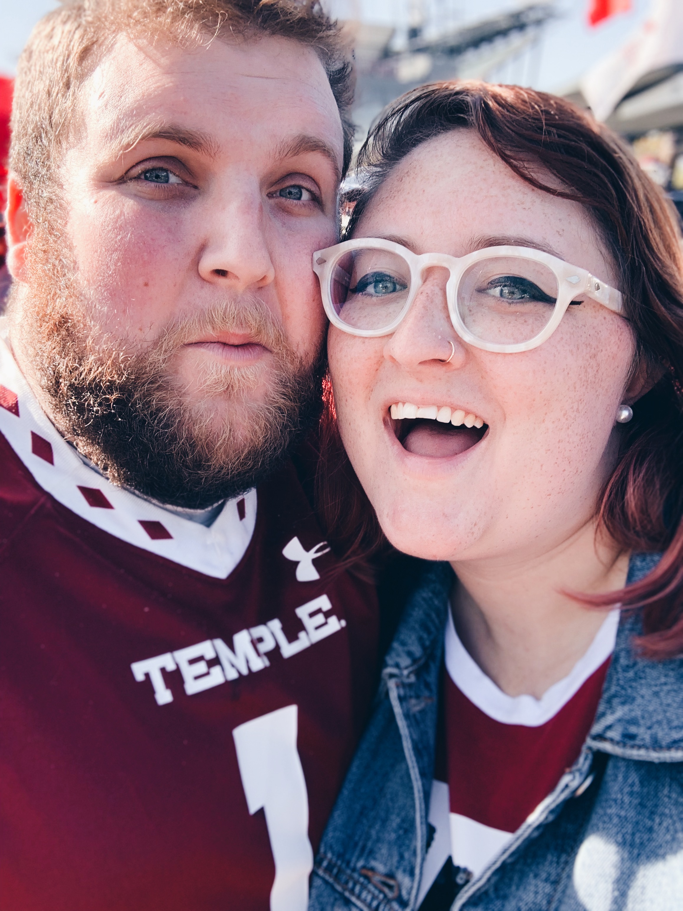 couple at temple football game