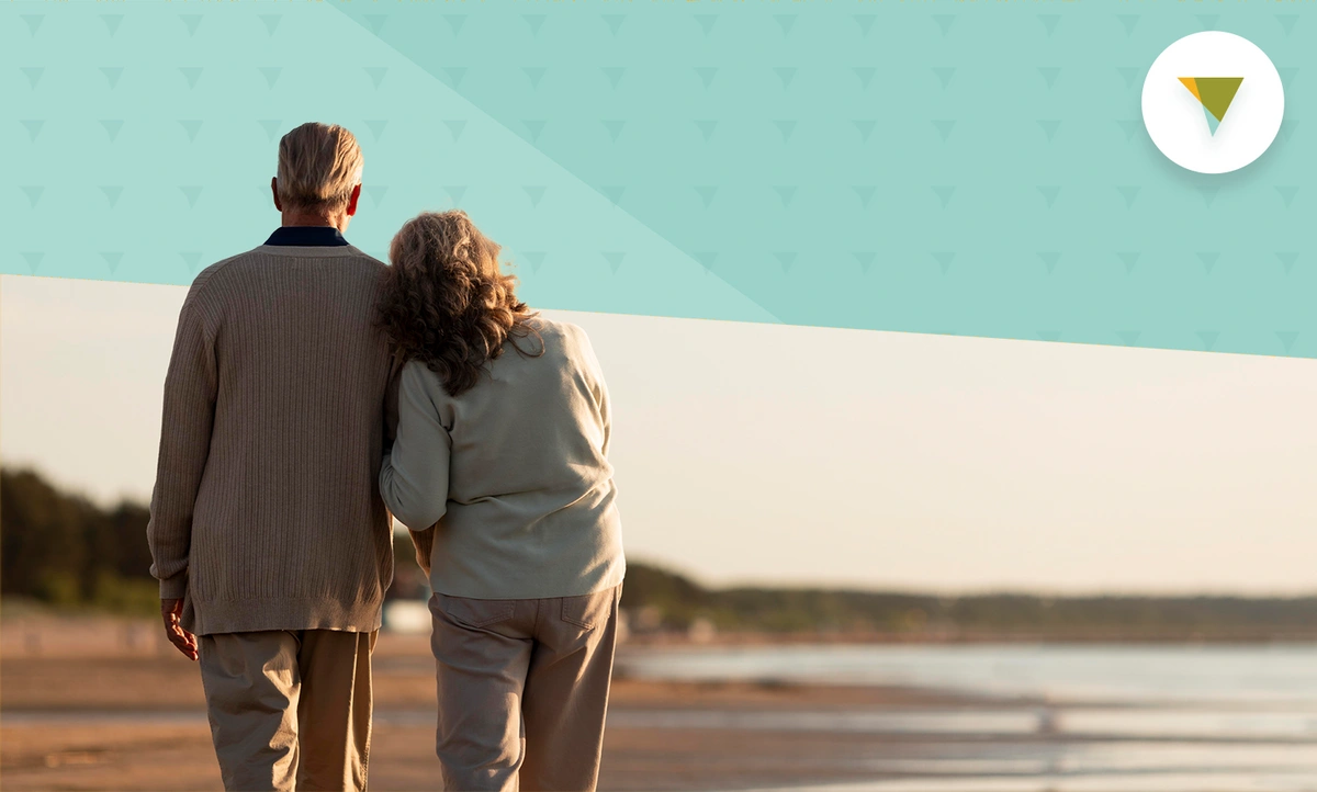 elderly-couple-on-beach.webp