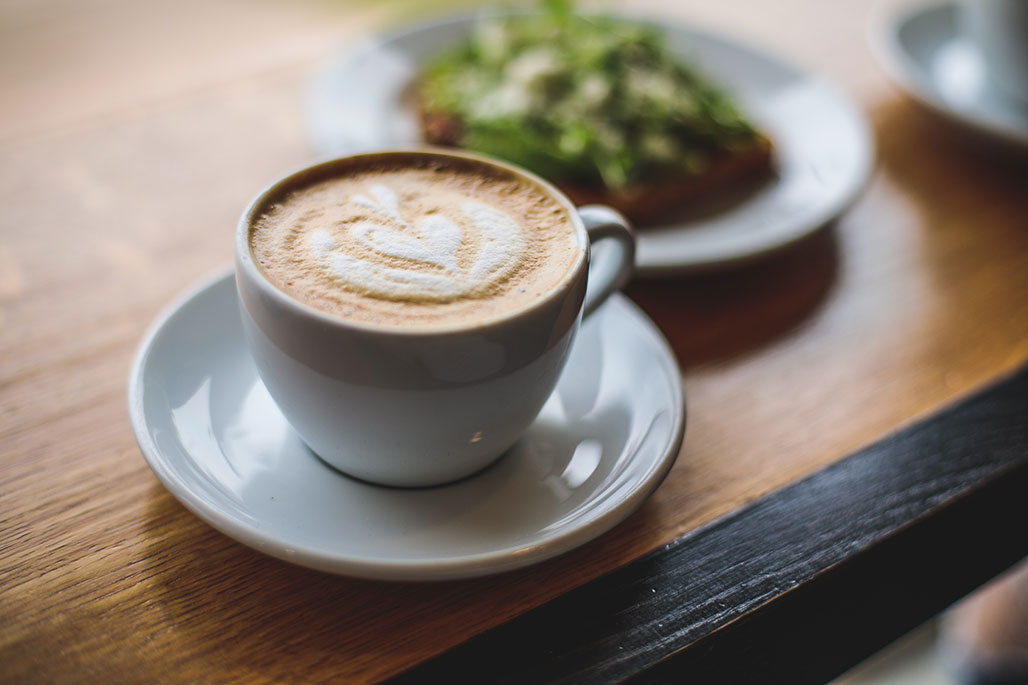 Premium AI Image  Morning capuchino with brown cinamon and white