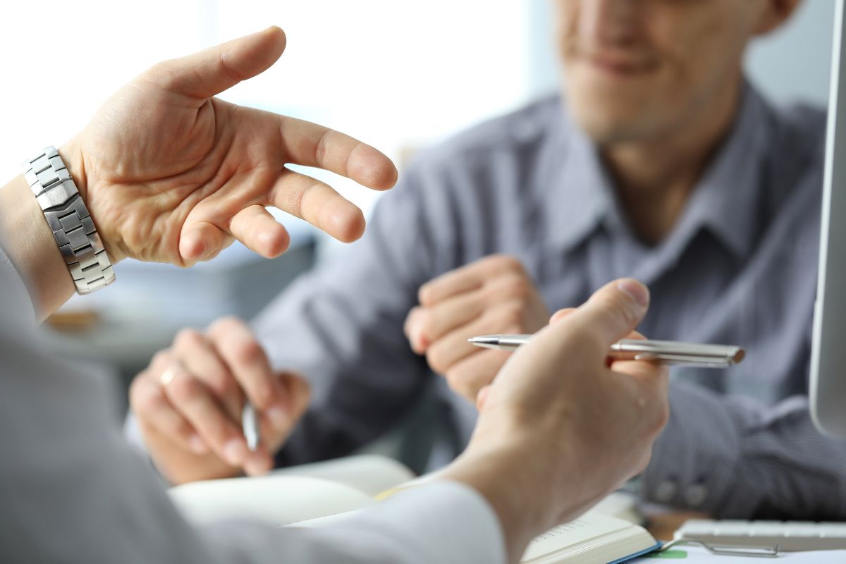 man explaining Medicare Advantage concepts to another man