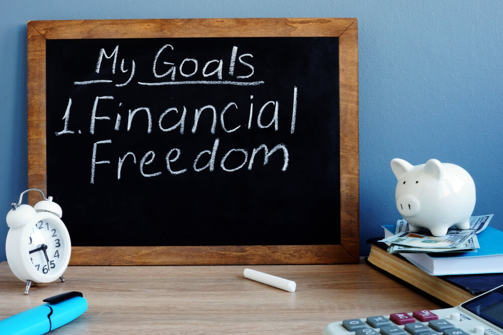 financial freedom written on a blackboard