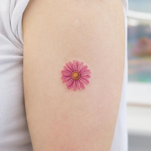 Cute daisy in upper arm