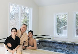 A proud Endless Pool owner with his grandchildren