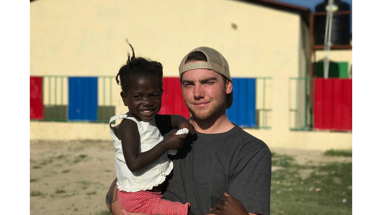 Dominic Rosacci of Superior Ink in Haiti during a trip with Allmade.